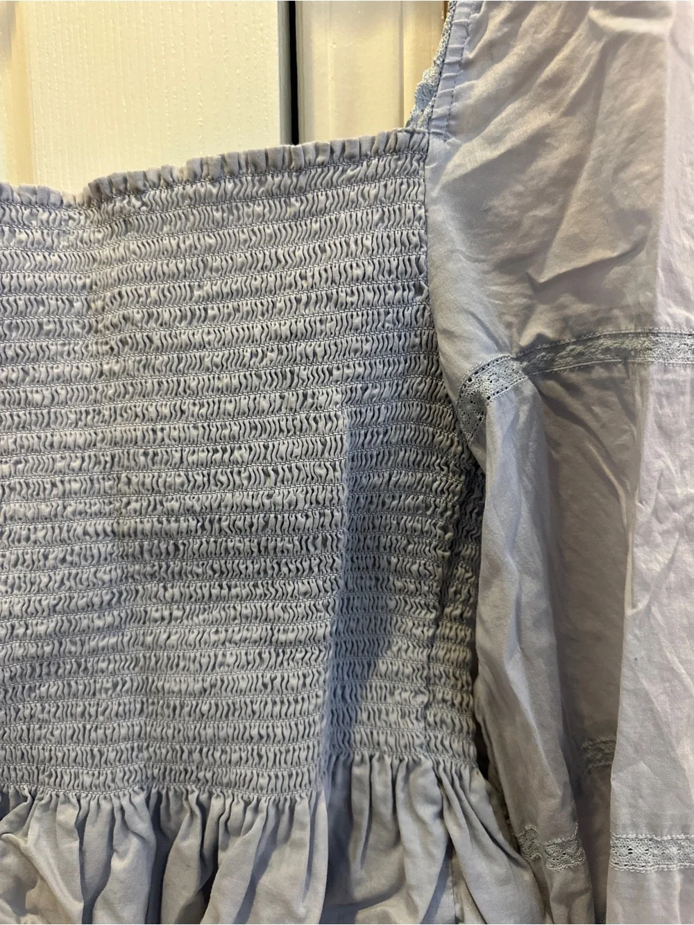 Reformation Roland Smocked Top in Mineral Blue